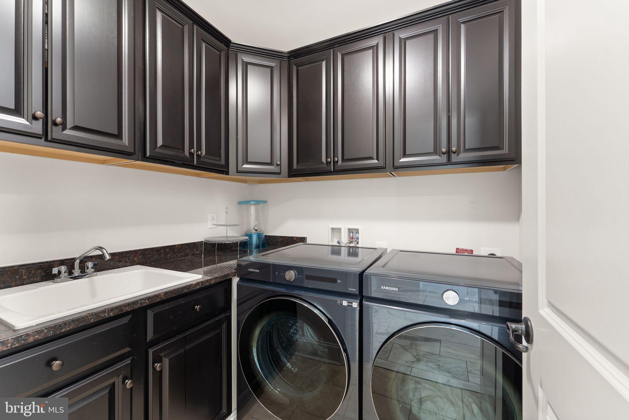 25873 Cameron Walk Place Aldie, VA 20105 - Photo 47 of 92 a utility room with dryer and washer