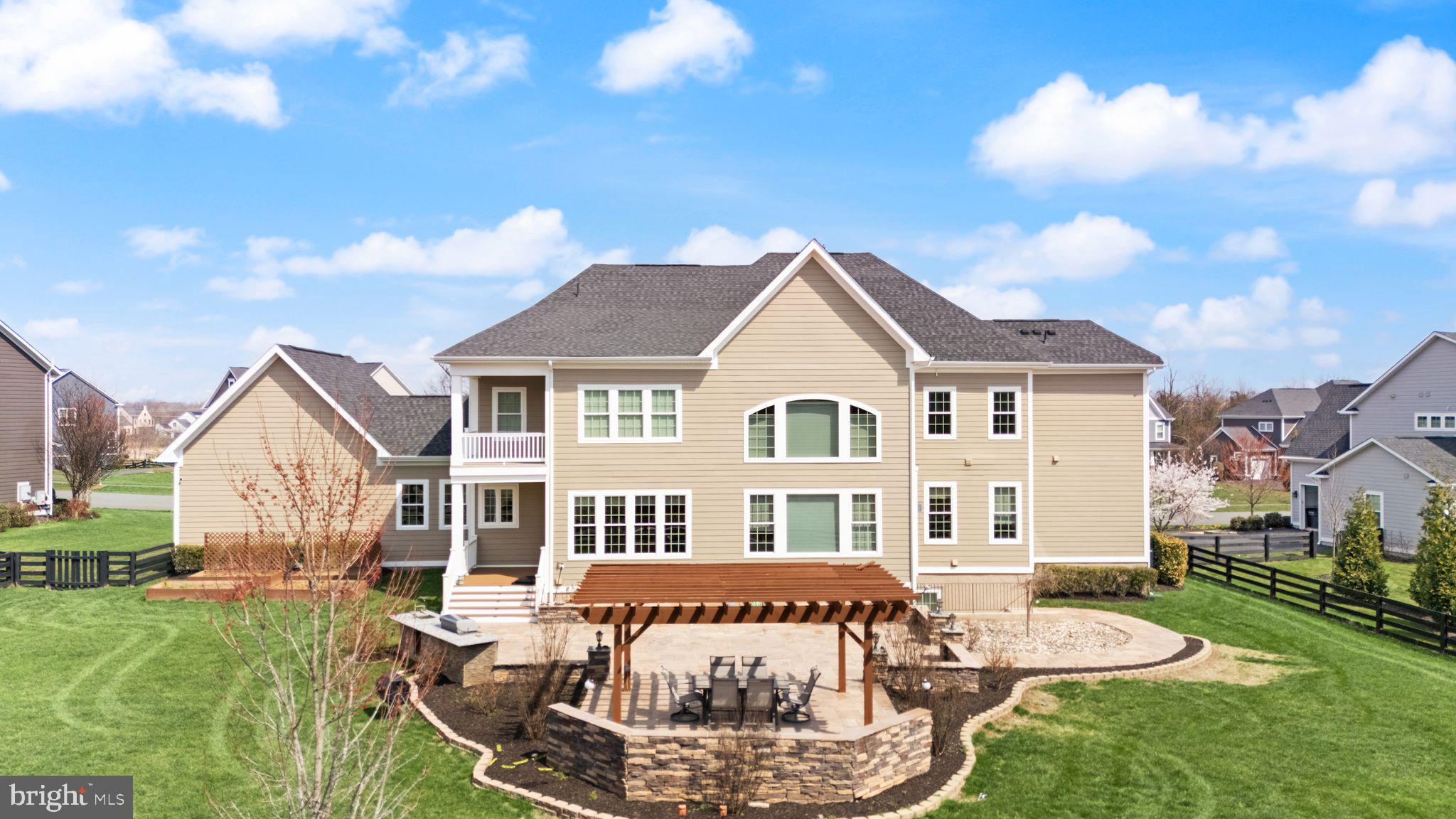 25873 Cameron Walk Place Aldie, VA 20105 - Photo 58 of 92 a front view of a house with a yard