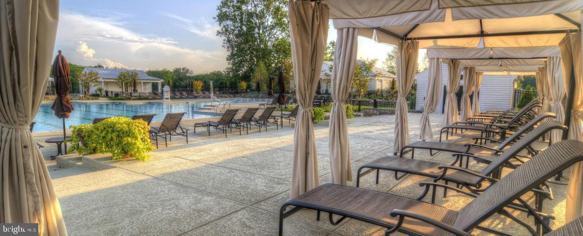 25873 Cameron Walk Place Aldie, VA 20105 - Photo 83 of 92 a view of an outdoor dining space with a patio