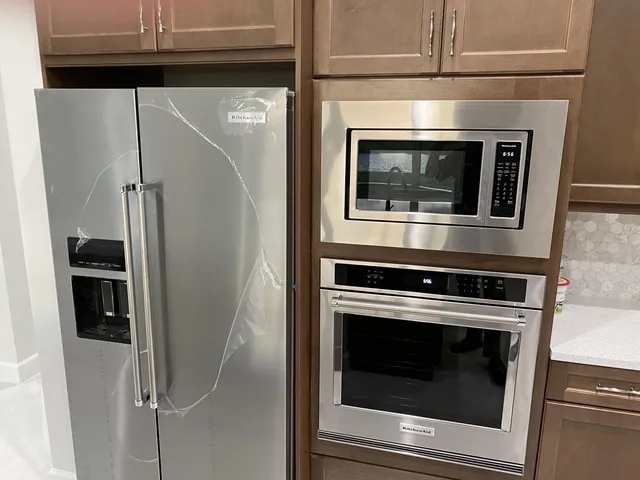 a view of room with window and a ceiling fan