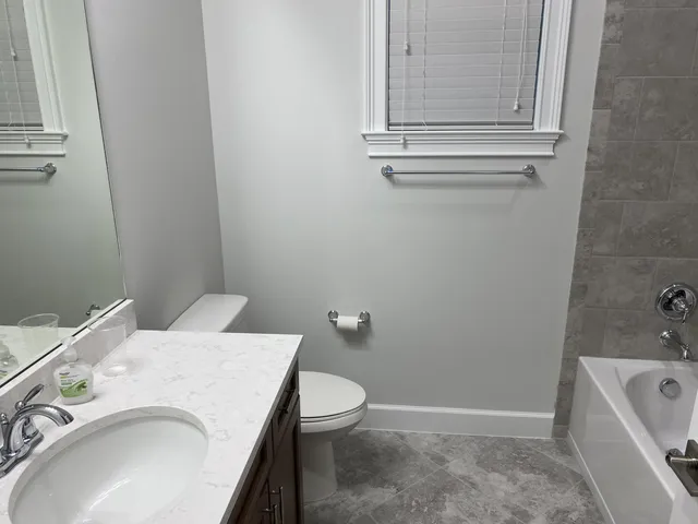 a bathroom with a sink and toilet