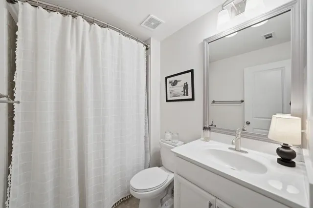 an aerial view of a house with a swimming pool