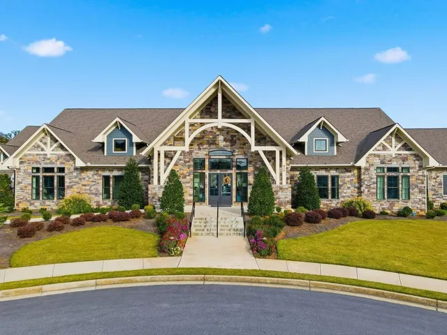 a view of a chairs and table in a patio