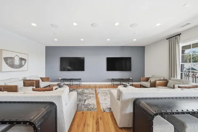 a view of a swimming pool and lounge chair