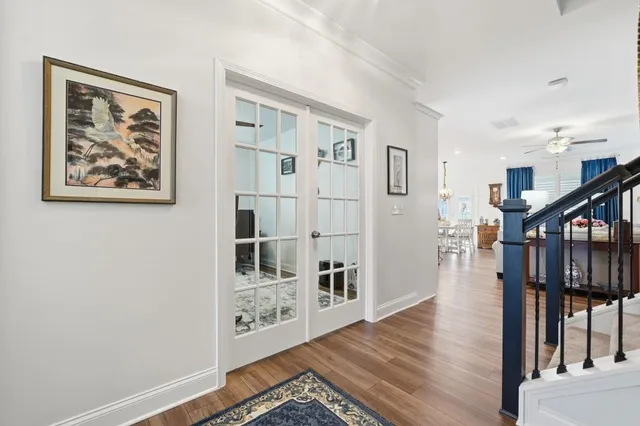 a kitchen with stainless steel appliances granite countertop a sink refrigerator and cabinets