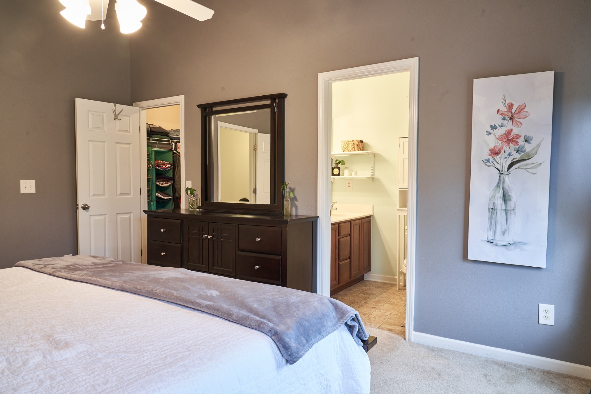 1924 Shaylin Loop Antioch, TN 37013 - Photo 15 of 22 a bedroom with a bed and a chandelier