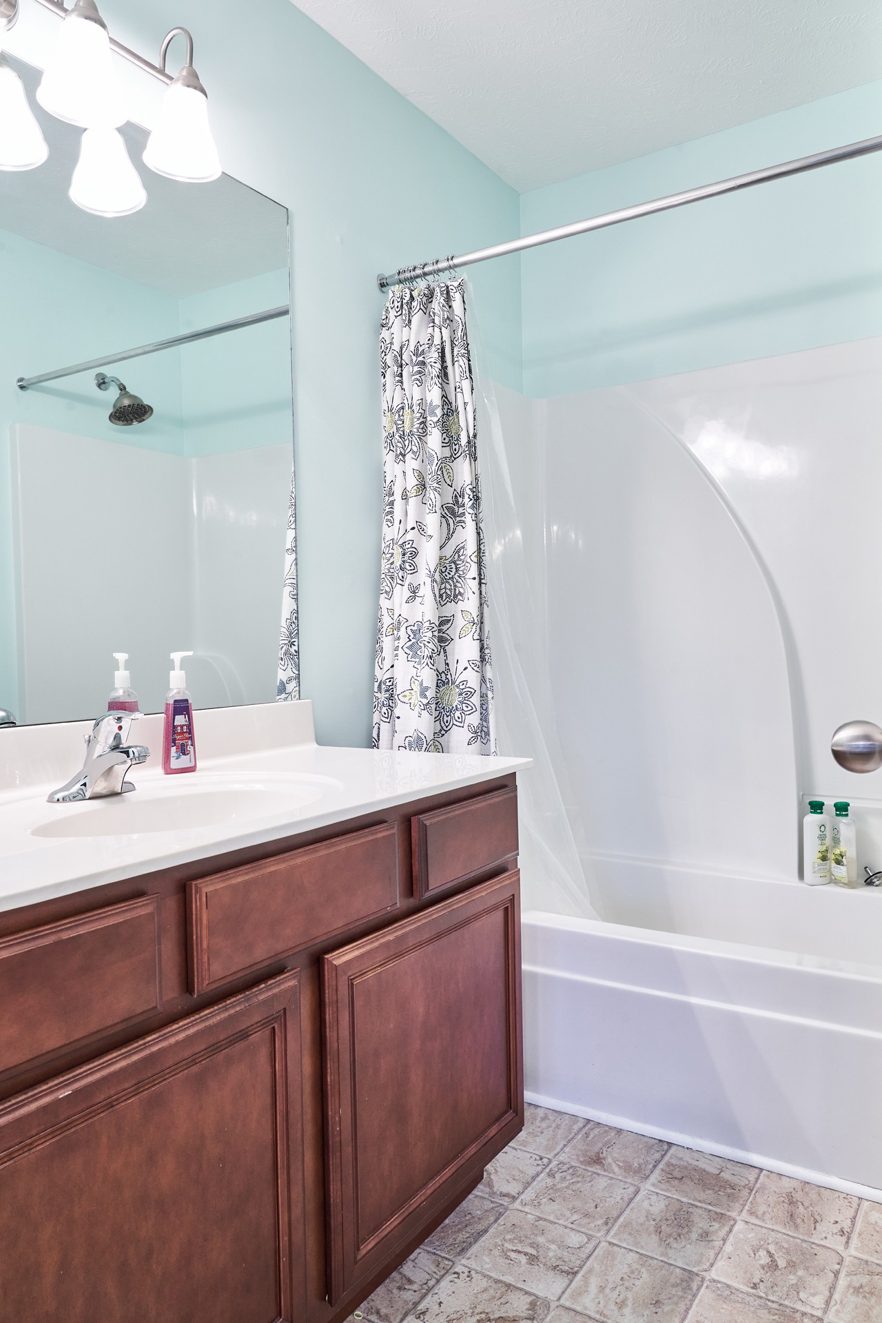 1924 Shaylin Loop Antioch, TN 37013 - Photo 21 of 22 a bathroom with a bathtub and a sink