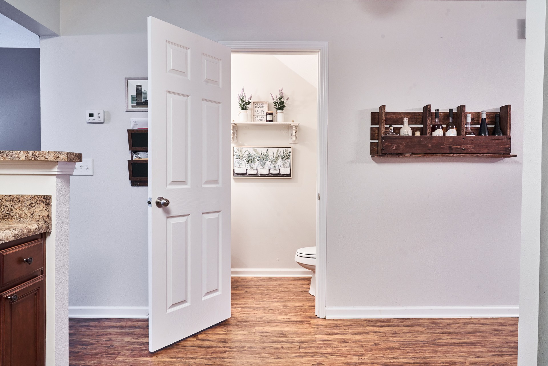 1924 Shaylin Loop Antioch, TN 37013 - Photo 6 of 22 a view of a bedroom with wooden floor and cabinet
