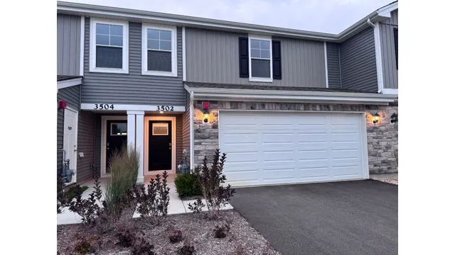 a view of a house with a garage