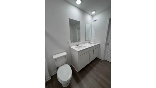 a view of a room with an open kitchen