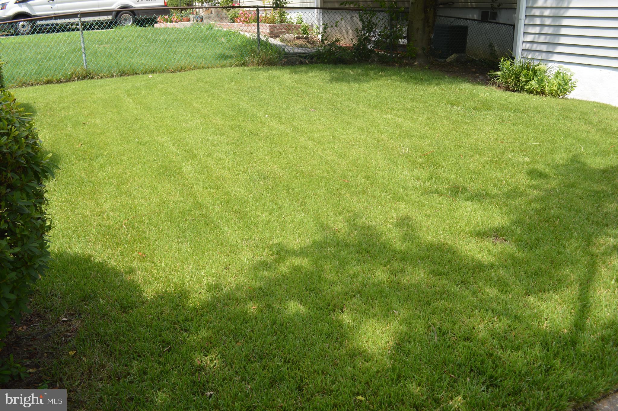 4712 Edgewood Road College Park, MD 20740 - Photo 2 of 45 Front yard; lush green grass with no weeds