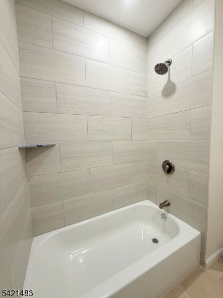 356 Carnegie Place, Unit 1 Union, NJ 07088 - Photo 6 of 10 a bathroom with a tub