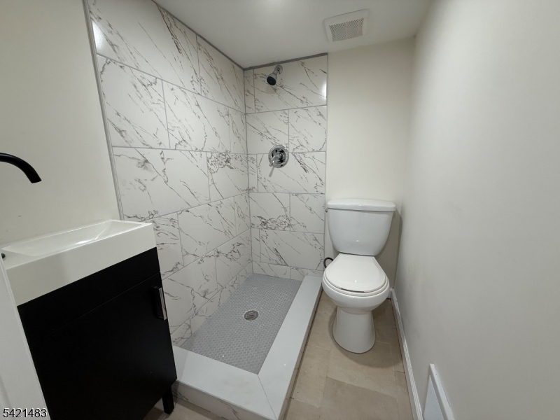 356 Carnegie Place, Unit 1 Union, NJ 07088 - Photo 10 of 10 a bathroom with a toilet and a shower
