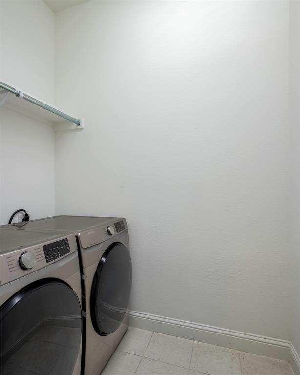 3603 Scotsman Road Sachse, TX 75048 - Photo 27 of 33 a utility room with dryer and washer