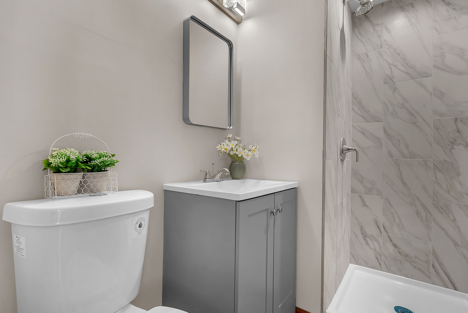 2957 192nd Place Lansing, IL 60438 - Photo 18 of 25 a bathroom with a sink toilet and a mirror