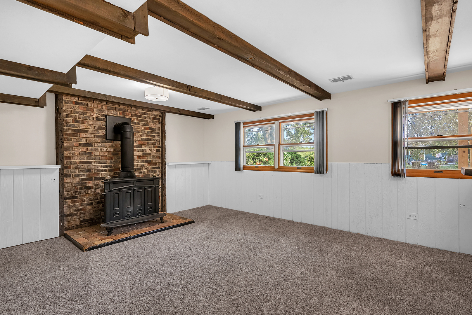 2957 192nd Place Lansing, IL 60438 - Photo 19 of 25 an empty room with fireplace and windows