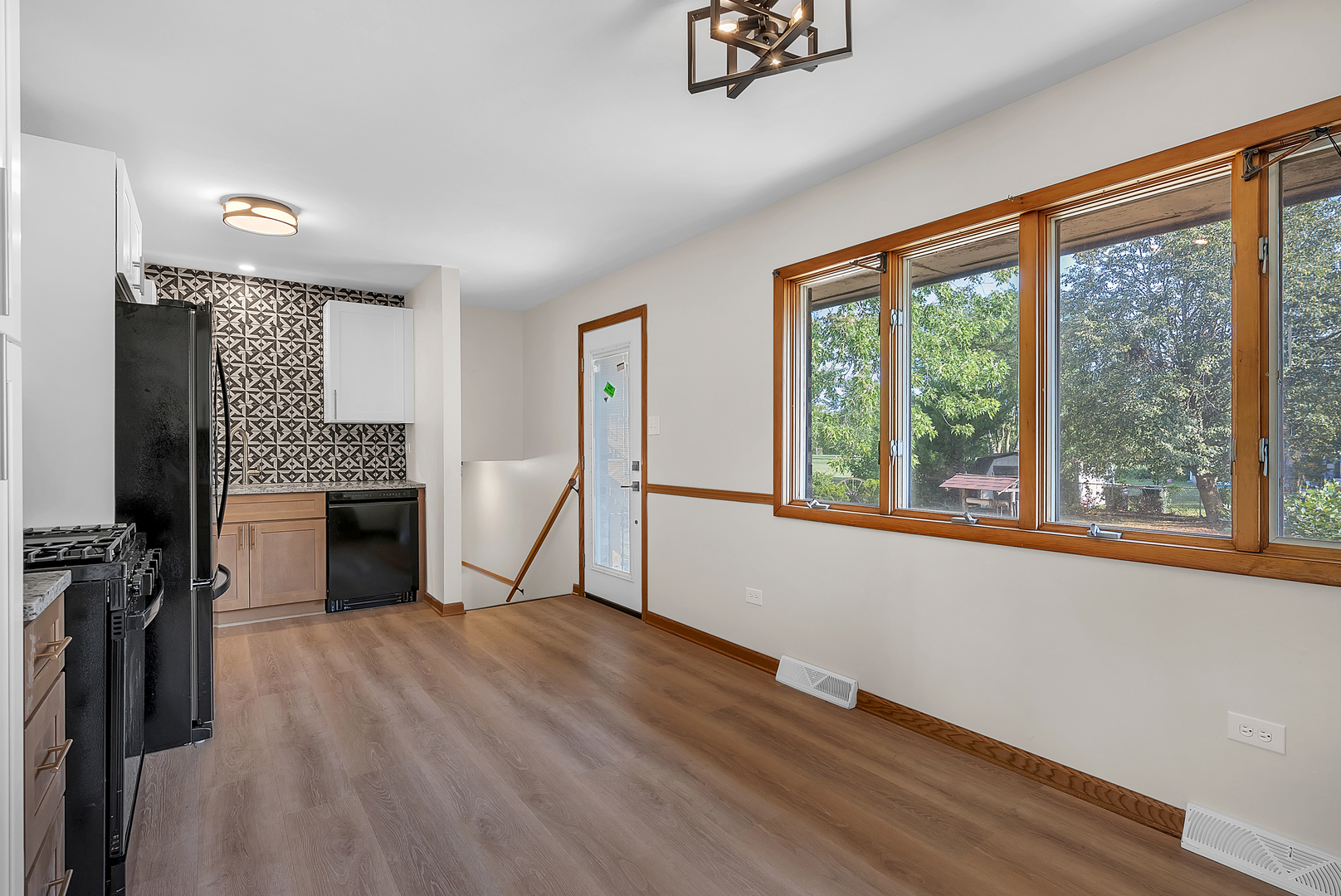 2957 192nd Place Lansing, IL 60438 - Photo 10 of 25 a view of a livingroom with an empty space and a fireplace