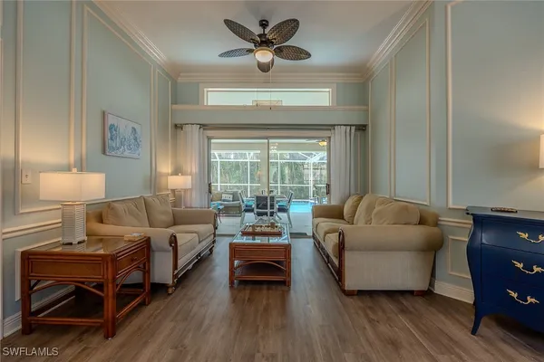 a living room with furniture and a window