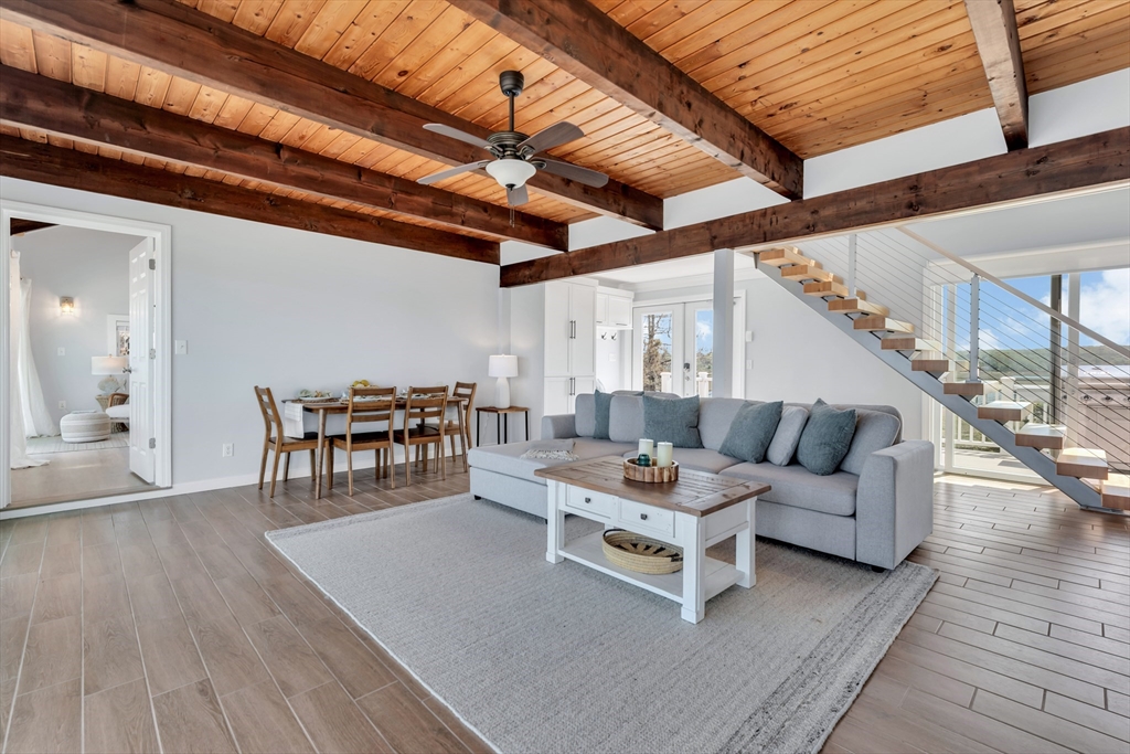 90 Salt Marsh Road East Sandwich, MA 02537 - Photo 11 of 40 a living room with furniture and wooden floor