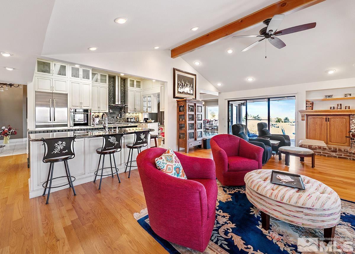 2215 Hedgewood Drive Reno, NV 89509 - Photo 14 of 39 a living room with furniture and a wooden floor