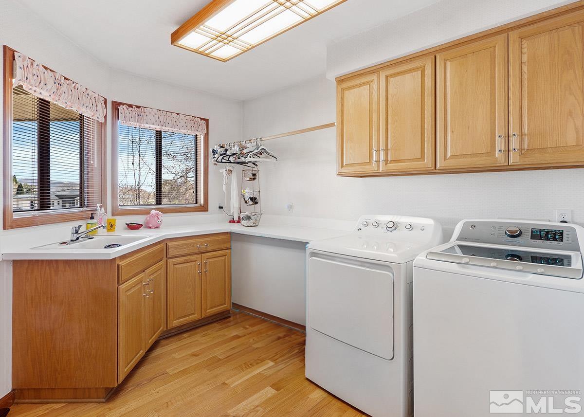 2215 Hedgewood Drive Reno, NV 89509 - Photo 21 of 39 a view of utility room and washer and dryer