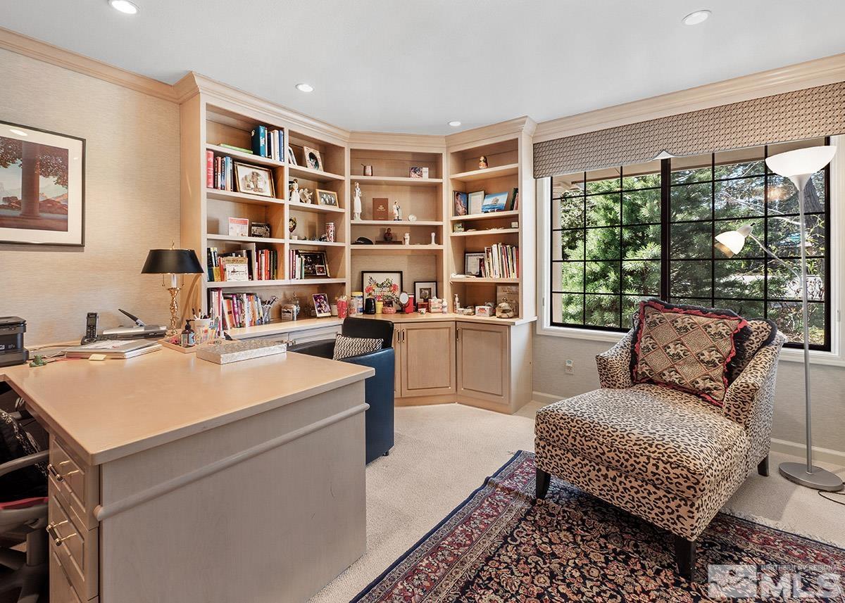 2215 Hedgewood Drive Reno, NV 89509 - Photo 28 of 39 a living room with furniture and a bookshelf