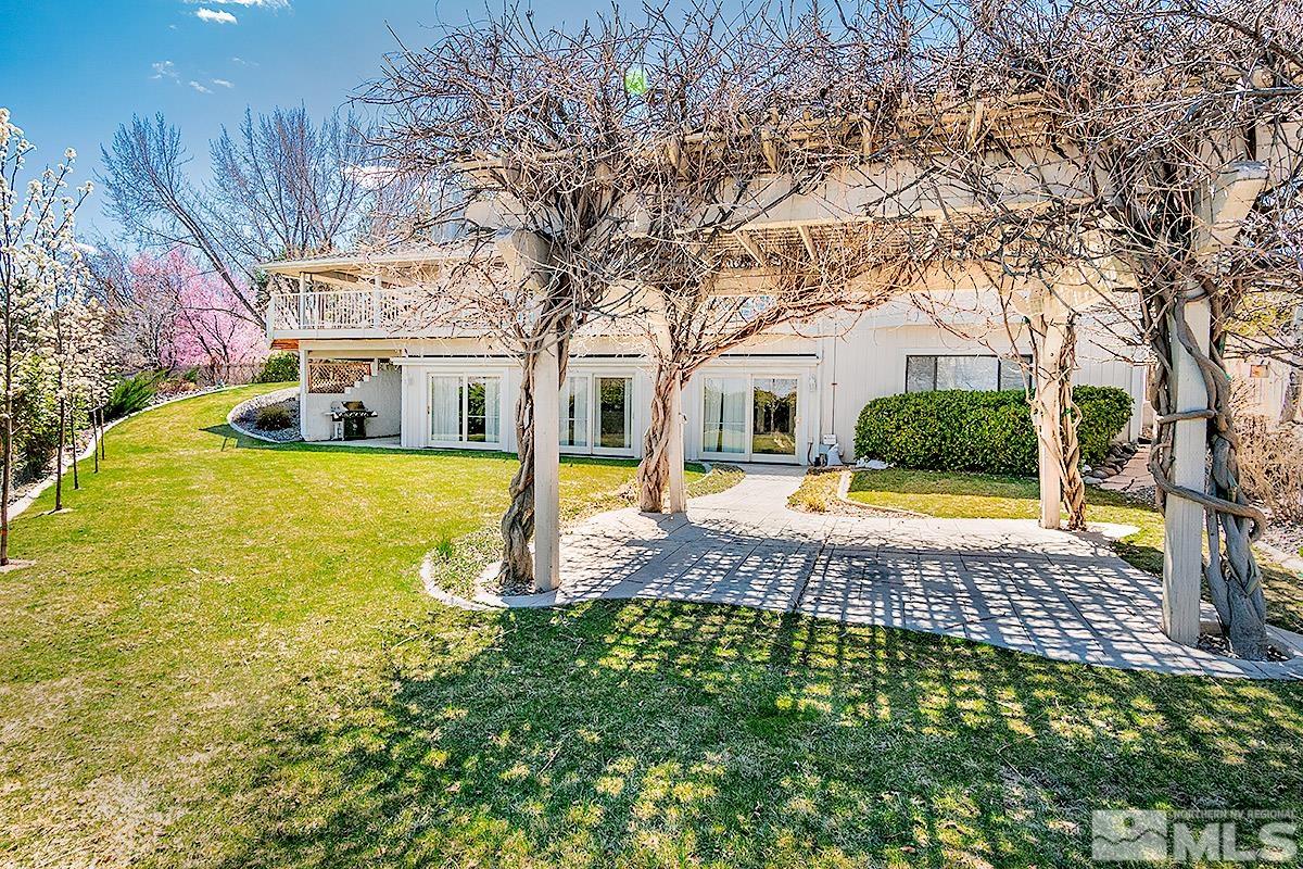 2215 Hedgewood Drive Reno, NV 89509 - Photo 37 of 39 a view of a house with swimming pool and sitting area