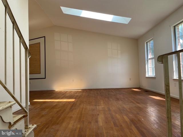 13403 Pendleton Street Fort Washington, MD 20744 - Photo 19 of 19 a view of an empty room with window and wooden floor