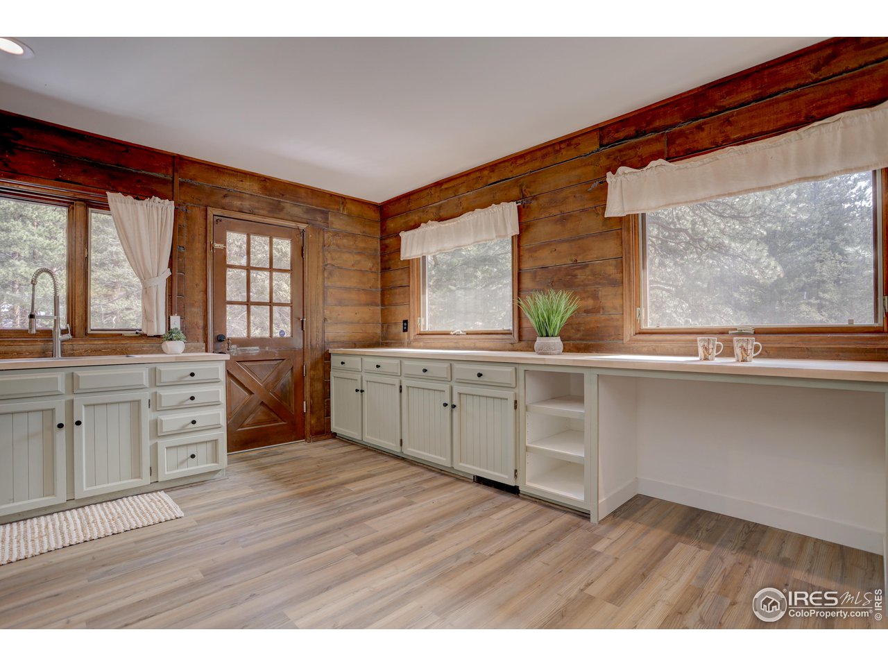 601 Pika Road Boulder, CO 80302 - Photo 12 of 38 a view of a kitchen with a large window