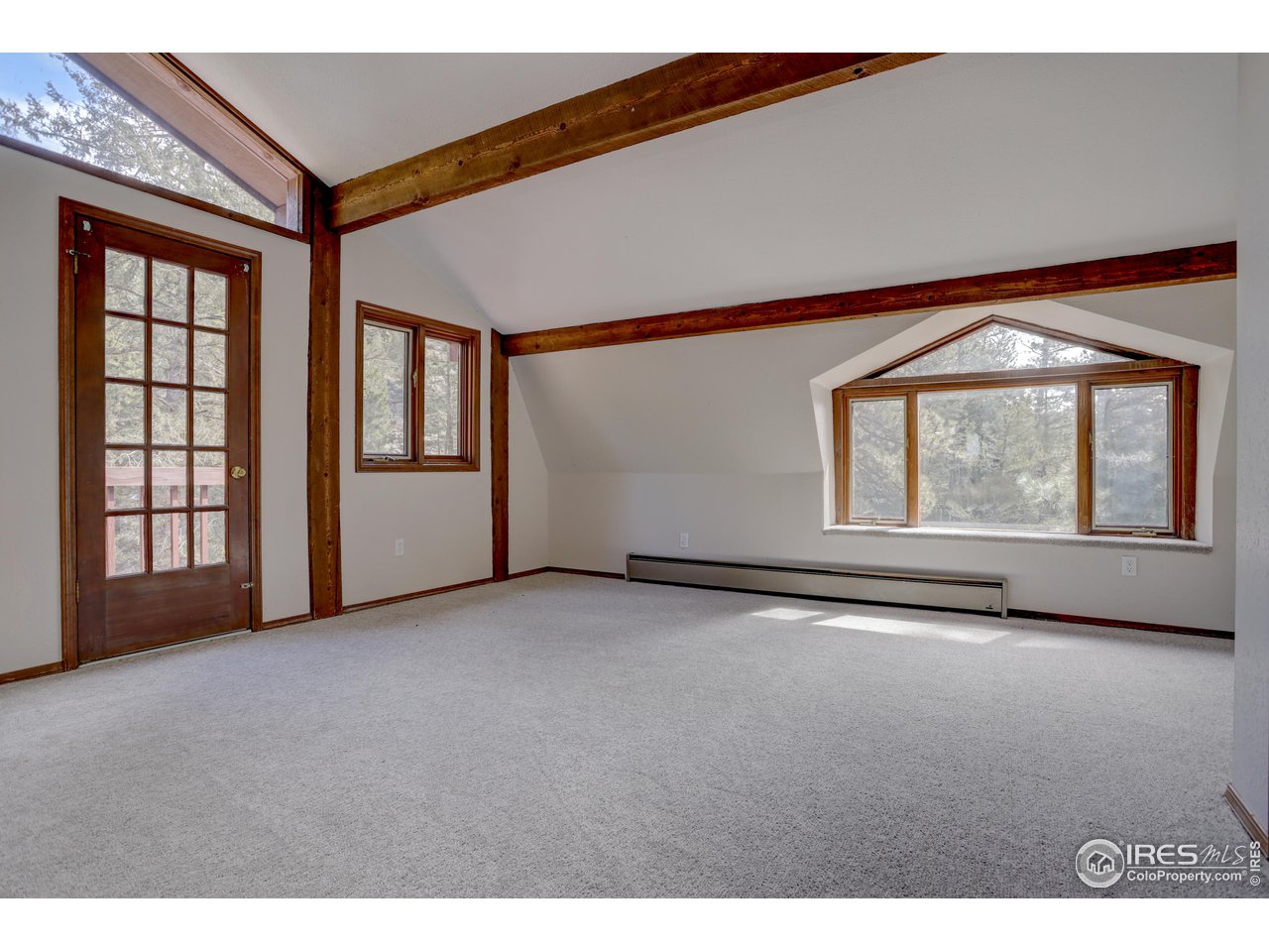 601 Pika Road Boulder, CO 80302 - Photo 16 of 38 a view of an empty room with a window