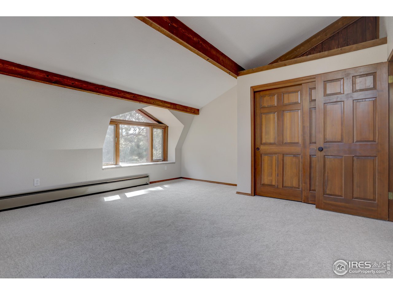 601 Pika Road Boulder, CO 80302 - Photo 17 of 38 a view of an empty room with a window