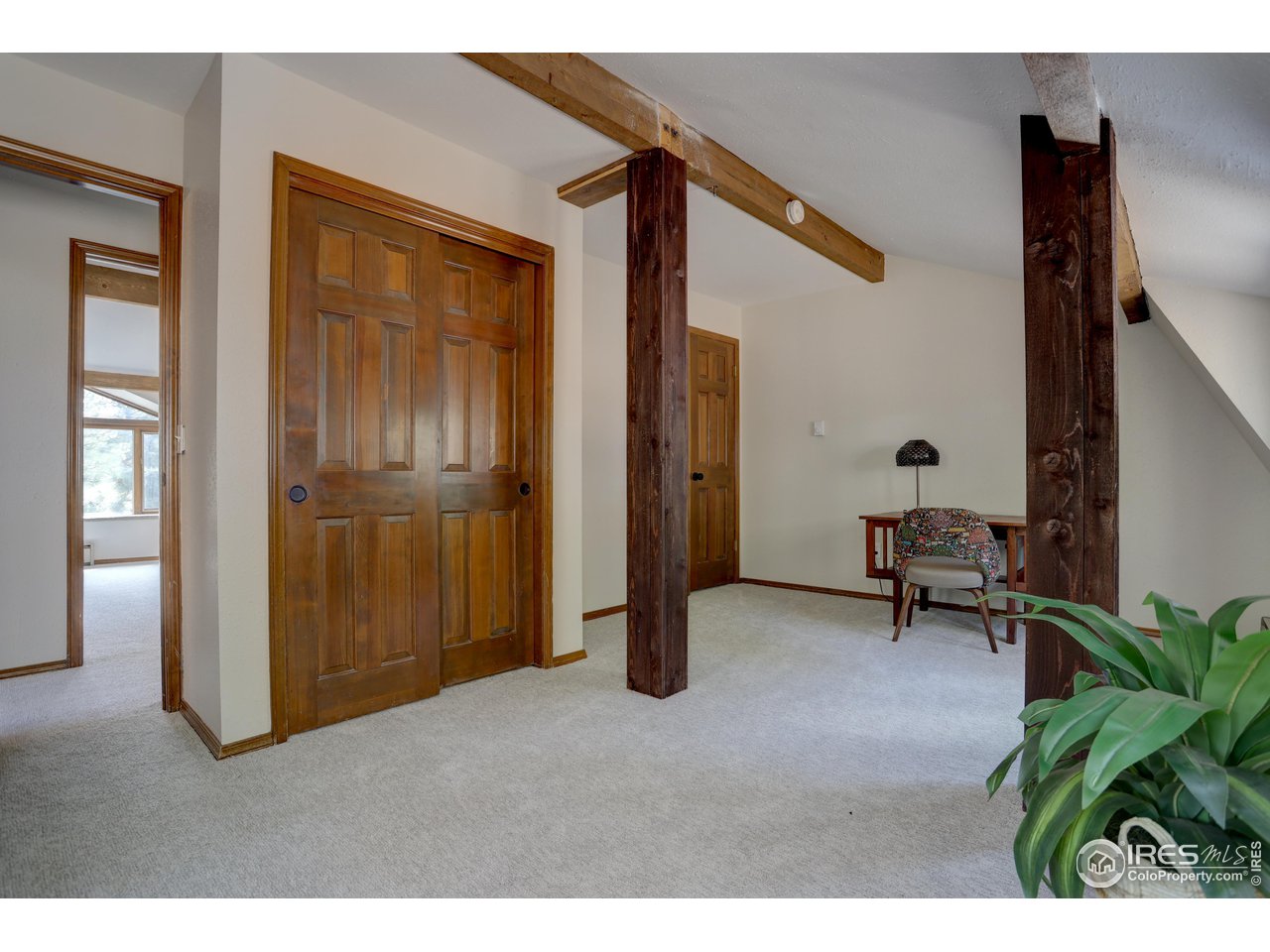 601 Pika Road Boulder, CO 80302 - Photo 21 of 38 a view of a livingroom with furniture and an entryway