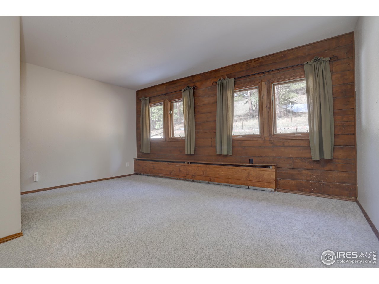 601 Pika Road Boulder, CO 80302 - Photo 22 of 38 a view of an empty room with a window