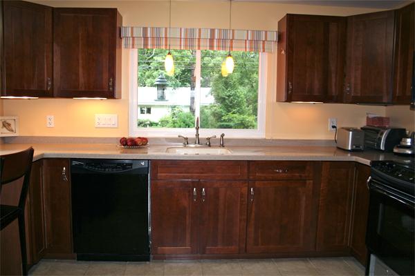 21 Harwood Road Natick, MA 01760 - Photo 11 of 20 a kitchen with a sink a window and cabinets