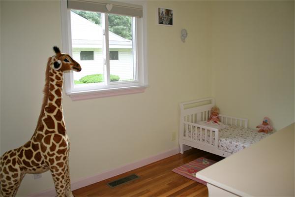 21 Harwood Road Natick, MA 01760 - Photo 15 of 20 a room with wooden floor and window