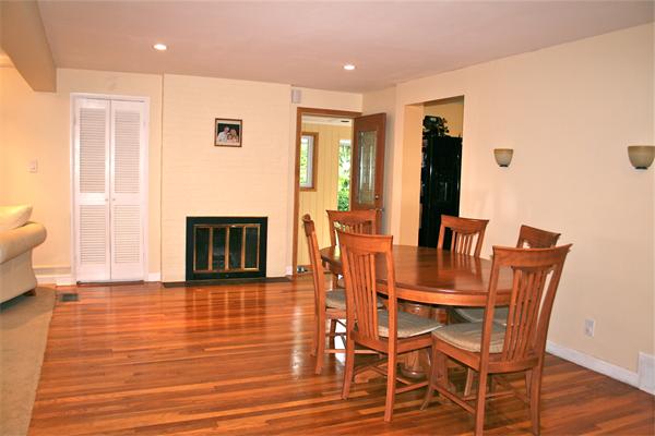 21 Harwood Road Natick, MA 01760 - Photo 9 of 20 a view of a dining room with furniture and wooden floor