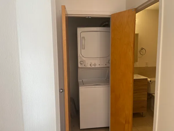 a bathroom with a bathtub and a toilet