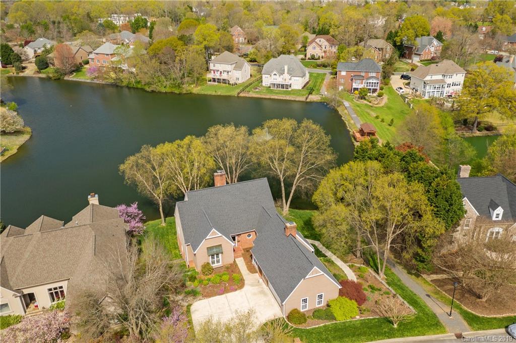 445 Cranborne Chase Fort Mill, SC 29708 - Photo 2 of 33 an aerial view of house with yard swimming pool and outdoor seating