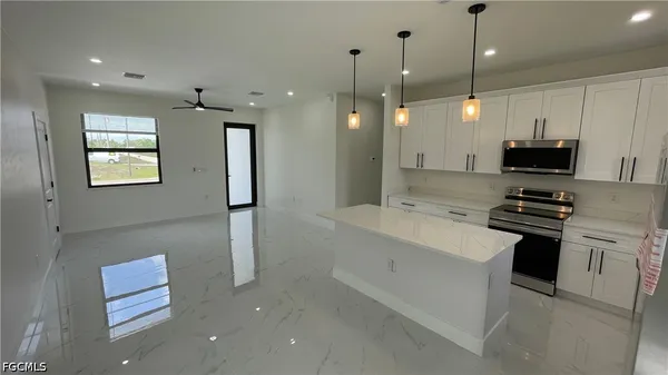 $1,700 | 528 Raintree Street East, Lehigh Acres, FL 33974