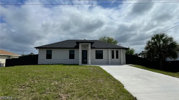 $1,700 | 528 Raintree Street East, Lehigh Acres, FL 33974