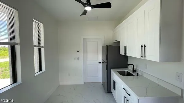 $1,700 | 528 Raintree Street East, Lehigh Acres, FL 33974