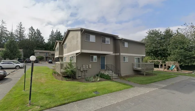 a view of a back yard of the house