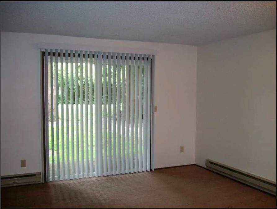 1315 North 18th Street Mount Vernon, WA 98273 - Photo 5 of 9 a view of an empty room with a window