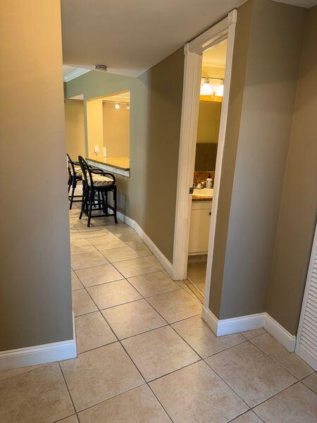 5501 Northwest 2nd Avenue, Unit 310 Boca Raton, FL 33487 - Photo 9 of 23 a view of a livingroom with furniture and front door