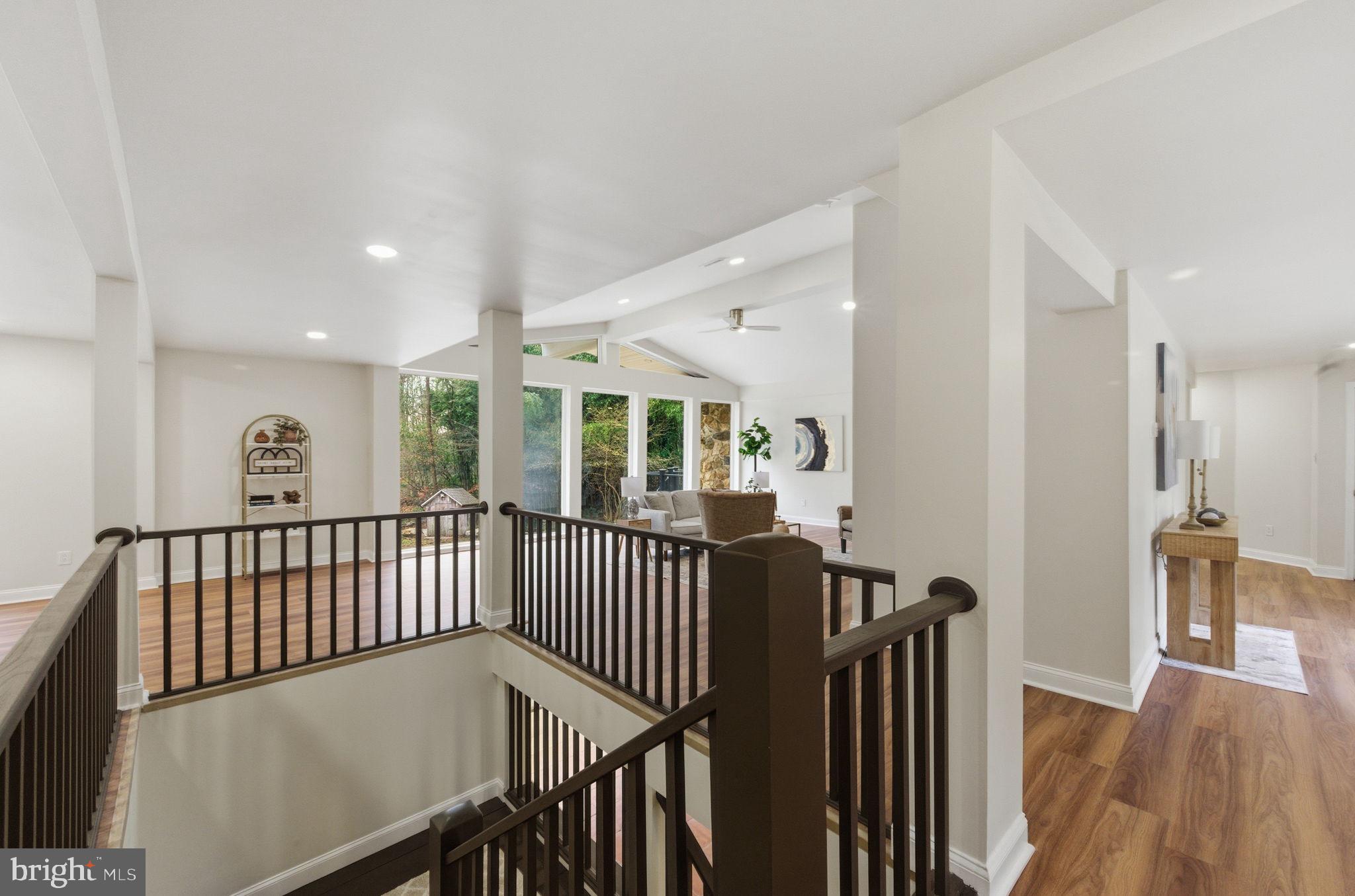 4 Meteor Lane Newark, DE 19711 - Photo 17 of 56 a view of hallway with wooden floor and windows