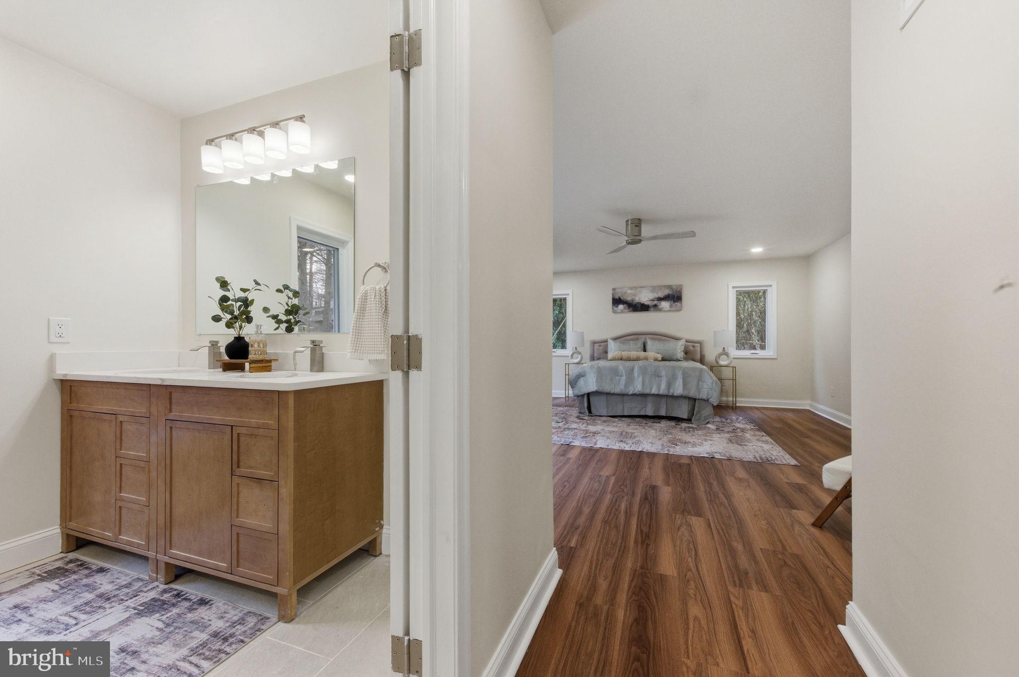 4 Meteor Lane Newark, DE 19711 - Photo 20 of 56 a view of a hallway with wooden floor and staircase