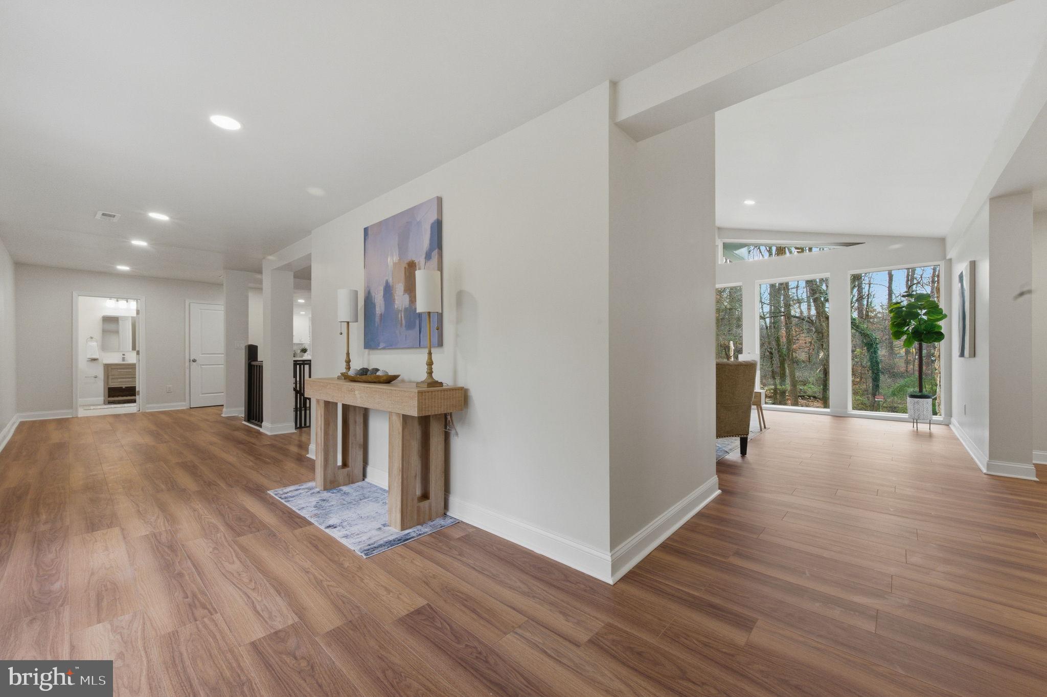 4 Meteor Lane Newark, DE 19711 - Photo 3 of 56 a view of a big room with wooden floor and windows