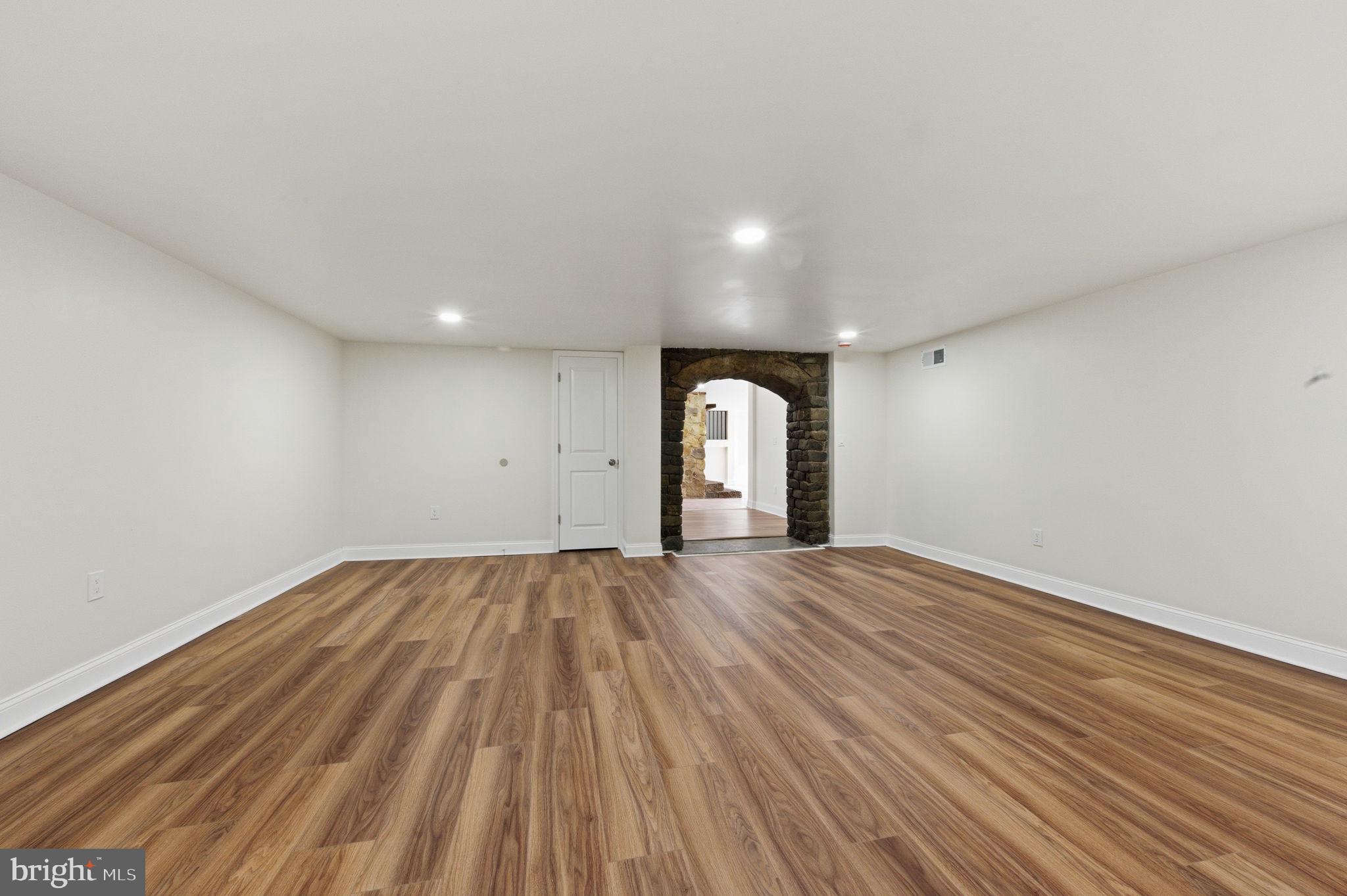 4 Meteor Lane Newark, DE 19711 - Photo 33 of 56 a view of empty room with wooden floor and fan