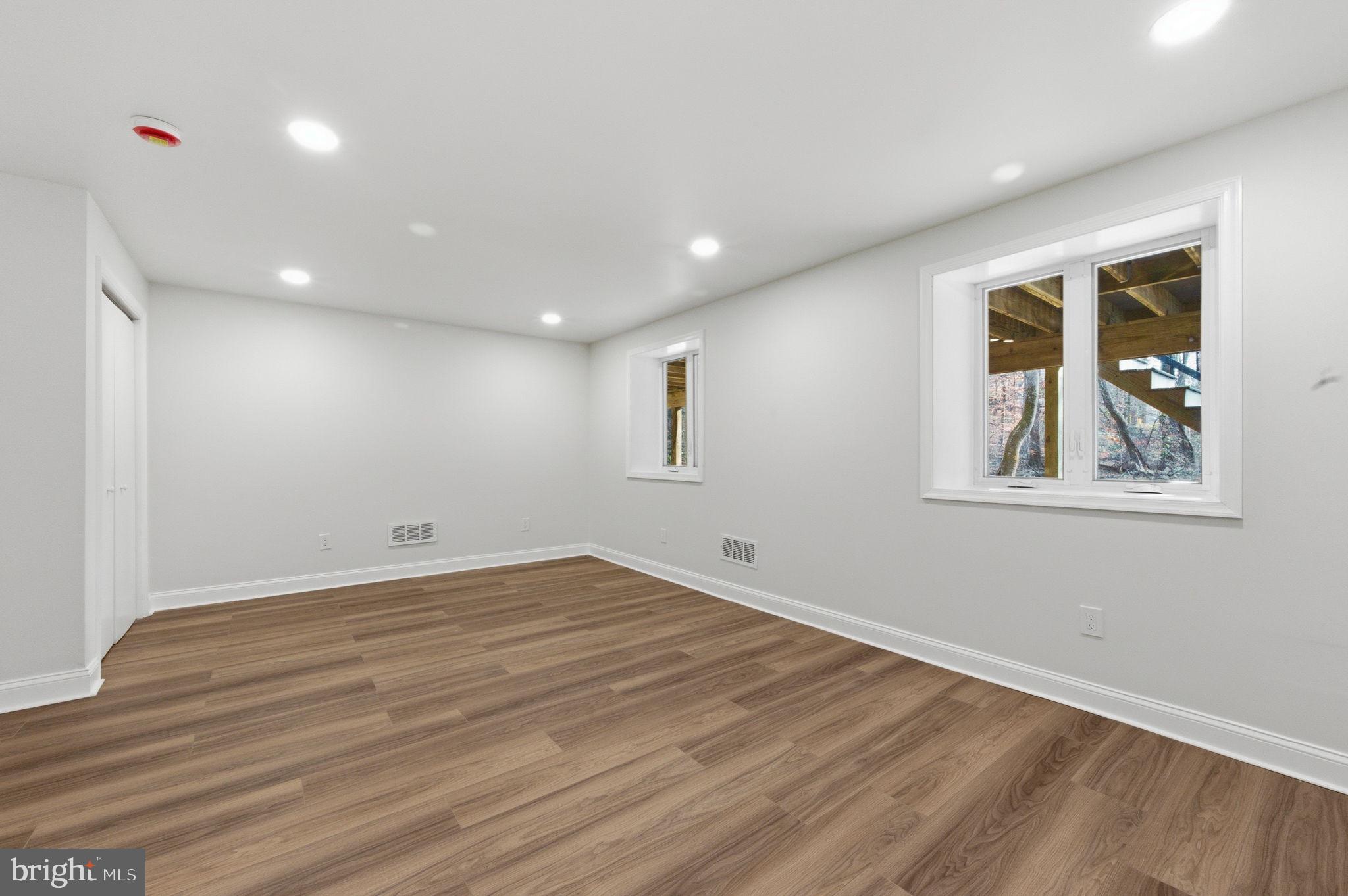 4 Meteor Lane Newark, DE 19711 - Photo 40 of 56 a view of empty room with wooden floor and fan