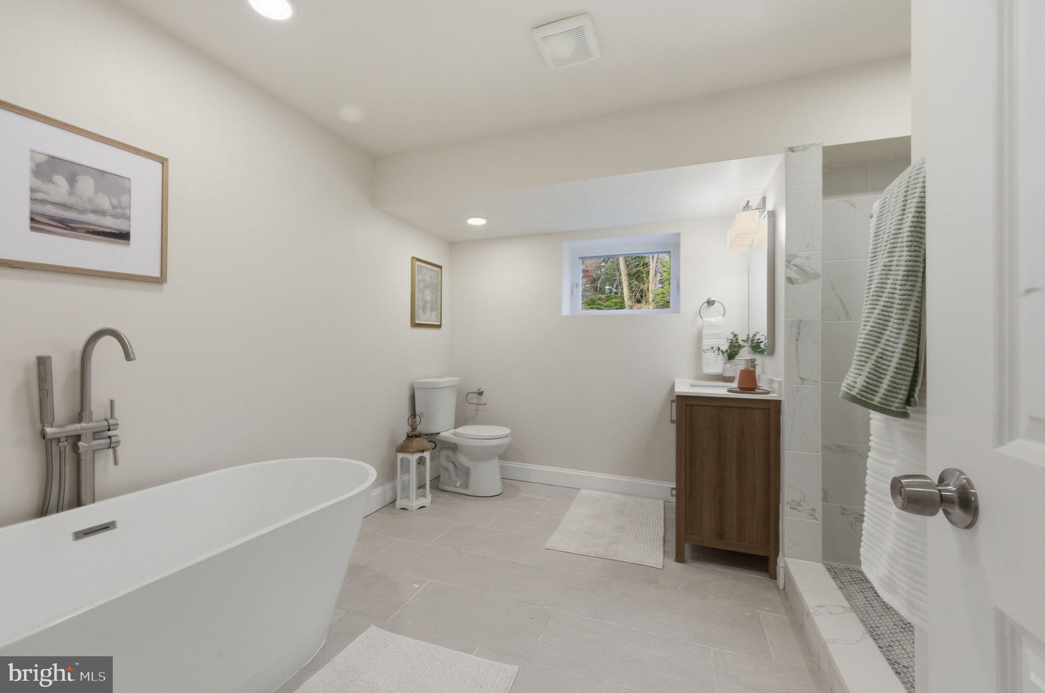 4 Meteor Lane Newark, DE 19711 - Photo 43 of 56 a bathroom with a bathtub sink and toilet
